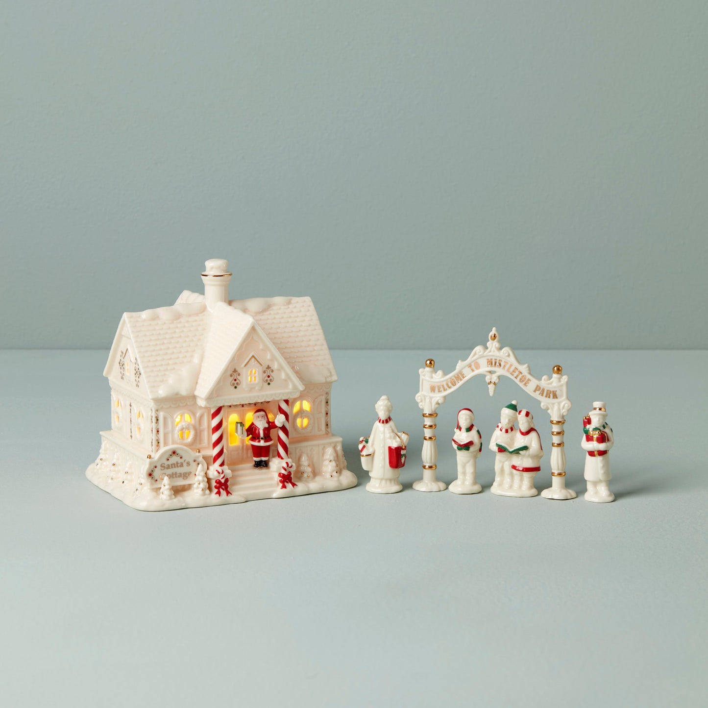Mistletoe Park Light-Up Cottage & Caroler Figurine